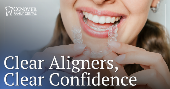 Clear Aligners, Clear Confidence female patient holding clear aligners